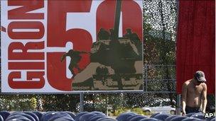 A worker arranges chairs for an upcoming parade to commemorate the 50th anniversary of the Bay of Pigs failed invasion at Revolution Square or Plaza de la Revolucion in Havana, Cuba, Friday April 15, 2011