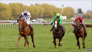 Beshabar ridden by Richard Johnson (left) went on to win from Merigo (centre)