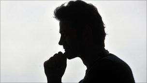 Male profile in silhouette