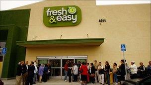 Shoppers queue outside a Tesco's Fresh & Easy in Los Angeles