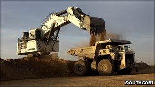 Minerals being loaded into a truck