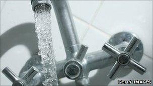 Water pouring from tap