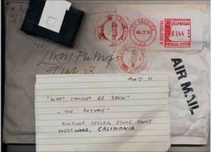 A pinhole camera a return envelope