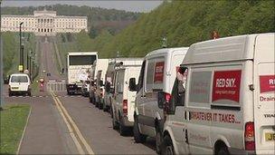 Red Sky vehicles in a convoy at Stormont