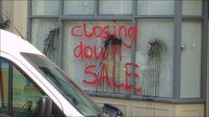 Closing down sale daubed on Tesco window