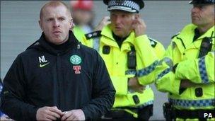 Neil Lennon and police at Celtic match