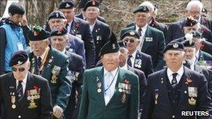 British war veterans marching during the Gloster Valley memorial service