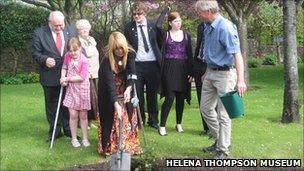 Hazel Barker planting a Bill Barker Rose