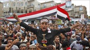 A Yemeni boy during a demonstration demanding the resignation of President Saleh, in Sanaa, Yemen, 26 April, 2011