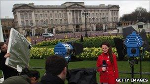 Reporter outside Buckingham Palace