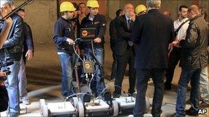 Researchers use a geo-radar device to search underground tombs in a Florence convent, Italy, 27 April