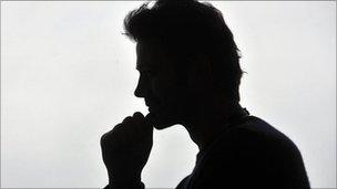 Male profile in silhouette