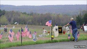 A man looks over the site of the Flight 93 crash in Shanksville, US (2 May 2011)