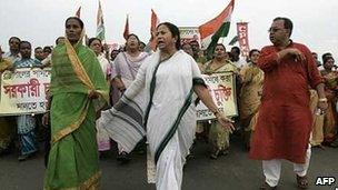 Mamata Banerjee leading his supporters