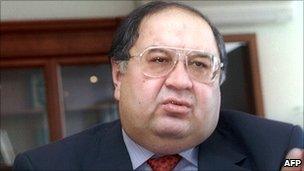 File picture taken 19 December 2001 shows Russian steel tycoon Alisher Usmanov as he gives an interview in his office in Moscow.