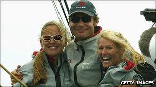 Alinghi Syndicate head Ernesto Bertarelli (C) with wife Kirsty (R) and her sister Donna (L) on February 20, 2003.