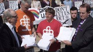 Don't Cut Us Out campaigners presenting their petition to Peter Catchpole, the council's cabinet member for adult social services