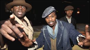 Three young men in costume