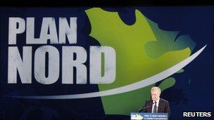 Quebec"s Premier Jean Charest speaks during the presentation of the Plan Nord