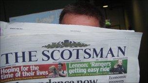 Man reading Scotsman