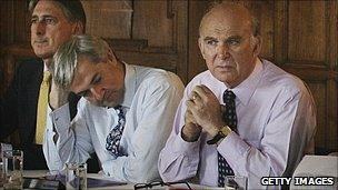 Chris Huhne (middle) and Vince Cable (right)