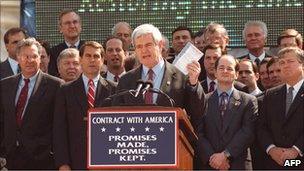 Newt Gingrich, centre, speaks on the steps of the US capitol in 1995