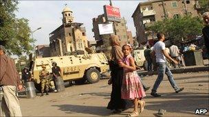 Egyptian military police guard the Virgin Mary church in Imbaba in the Egyptian capital of Cairo on May 10, 2011