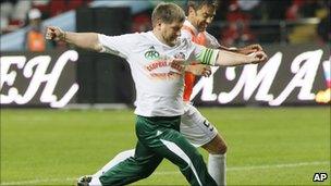 Ramzan Kadyrov and Alessandro Costacurta fight for the ball