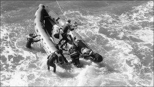 High tide launches required the helmsman to clip a lead on to a long line that was anchored off shore (Copyright: UWC Atlantic College)