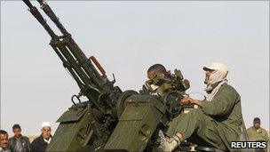 Libyan soldiers loyal to leader Muammar Gaddafi are seen in the city of Tarhouna, 85 km (53 miles) south of Tripoli, 27 April 2011