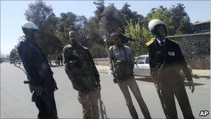 Syrian security forces pictured on a mobile phone in Damascus, 24 April 2011