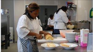 Young people learning cookery skills