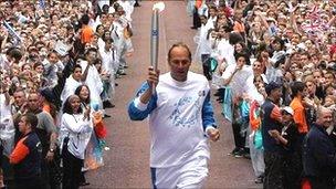 Sir Steve Redgrave carries the 2008 Olympic torch