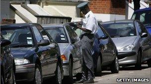 Parking warden and parked cards