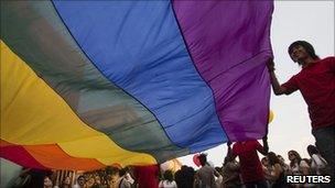 Revellers take part in a demonstration by the Lesbian, Gay, Bisexual and Transgender community