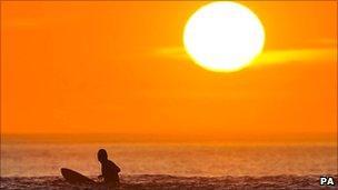 Sunshine and surfer in Devon