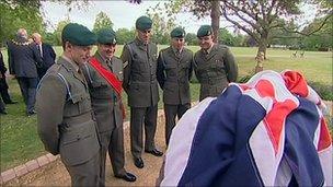 Marines from 40 Commando looking at the memorial stone in Vivary Park, Taunton