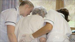 nurses caring for a patient