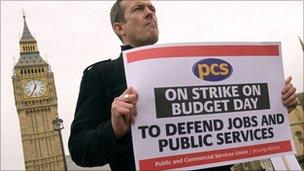 Protestors from the Public and Commercial Services Union (PCS) demonstrate outside the Houses of Parliament in central London, on March 24, 2010,