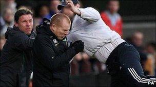 Celtic manager Neil Lennon being attacked