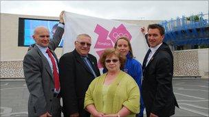 Martin Yardley chief executive of Coventry City Council, council leader John Mutton,June Jeffrey of the Coventry Community Empowerment Network, Jo Deakins, former Coventry Olympic swimmer (Barcelona and Atlanta games) and Tom Clift, Coventry and Warwickshire 2012 Co-ordinator