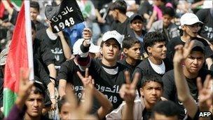 Palestinian youths at a rally in the West Bank city of Jenin