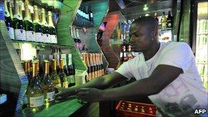 A bar worker in Yopougon, Abidjan