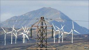 Pylon and wind turbines in Scotland