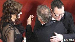 Lars Von Trier (r) with his wife Bent Froge (l) and Cannes president Thierry Fremaux