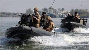 British Royal Marines conducting operations on waterways in the Basra region of southern Iraq