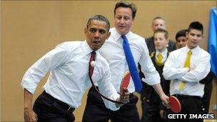 Barack Obama and David Cameron playing table tennis