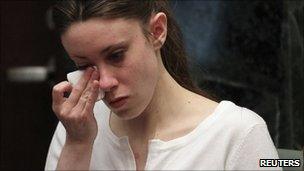 Casey Anthony wipes away tears