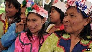 Indigenous women of the Embera ethnic group, among 200 people displaced from their land, at a park in Bogota, Colombia on 30 April, 2011