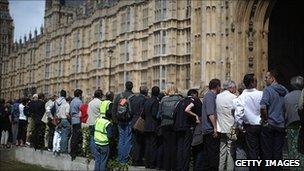 Members of the public try to get a glimpse of President Obama as he arrives at Parliament